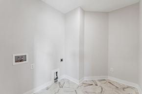Woodbury house for rent - A room with a white marble floor and a picture on the wall.