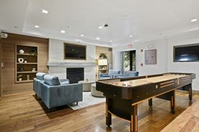 Boston apartment for rent - a game room with a pool table and a tv