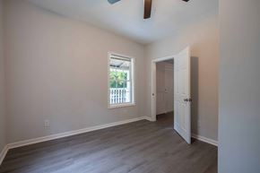 Fayetteville house for rent - A room with a window and a door.
