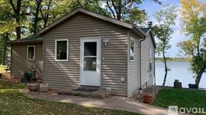 Long Prairie house for rent - A small house with a white door is available for rent.