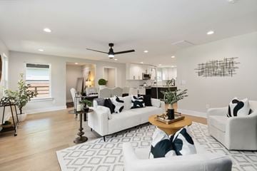 Charlotte house for rent - A modern living room with a white sofa and a coffee table.