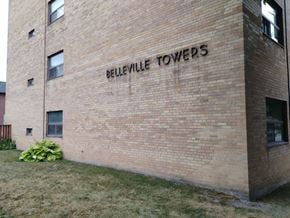 Belleville apartment for rent - A brick building with the words "Belleville Towers" on it.