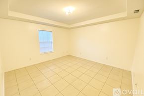 Mc Allen apartment for rent - A room with a window and tiled floor.