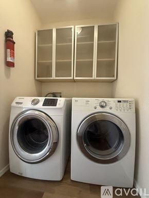 Tucson house for rent - A bedroom with a bed, a bookshelf, and a nightstand.