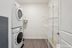 Eastampton Township apartment for rent - A bedroom with a large bed and a painting on the wall.