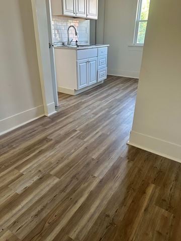 Lorain apartment for rent - A kitchen with a white cabinet and a sink.