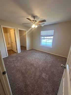 Centerton house for rent - A room with a ceiling fan and carpeted floor.