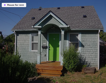 Portland house for rent - A small house with a green door is for rent.