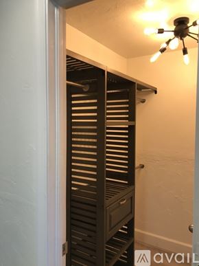 Naples apartment for rent - A wooden closet with a light on the ceiling.