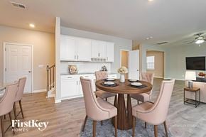 Lexington house for rent - A dining room with a round table and chairs.