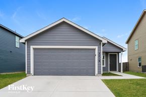 New Braunfels house for rent - A house with a garage door that says 2416.