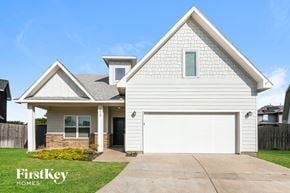 North Richland Hills house for rent - A white house with a garage is for sale.