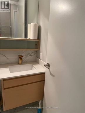 Toronto (Church-Yonge Corridor) condo for rent - A bathroom with a sink and a mirror.