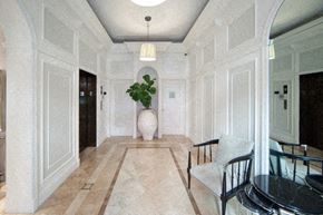 Coral Gables apartment for rent - a dining room with a table and chairs and a large vase