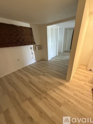 Venice house for rent - A kitchen with white cabinets and a white oven.