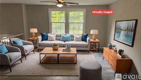 Chesterfield County house for rent - A living room with a couch, chairs, and a coffee table.
