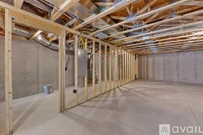 Park City house for rent - A room under construction with wooden beams and insulation.