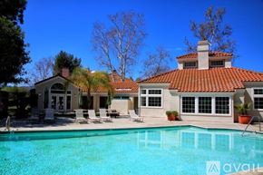 Calabasas apartment for rent - A large house with a pool in front.