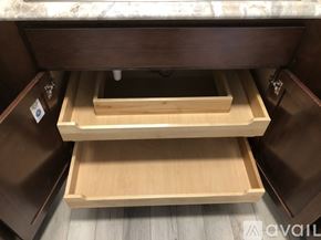 Fairfax apartment for rent - A wooden drawer with a lock is open.
