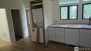 Mount Jackson apartment for rent - A kitchen with a sink, cabinets, and a window.