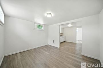 College Place apartment for rent - A kitchen with white cabinets and a granite countertop.