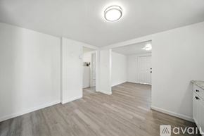 College Place apartment for rent - A room with a door and a window.