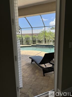 Venice house for rent - A patio with a pool table and a chair.