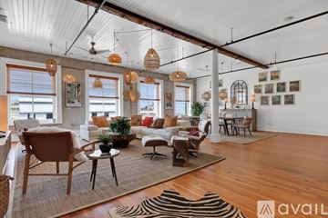 Savannah apartment for rent - A living room with a zebra rug on the floor.