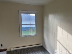 Oak Hill apartment for rent - A room with a window and a radiator on the floor.