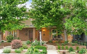 Denver house for rent - A house with a brown door and a small porch.