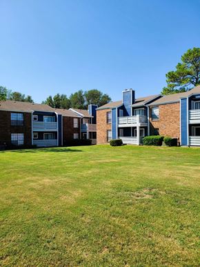 Sherman apartment for rent - A grassy area in front of apartment buildings.