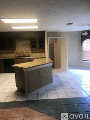 San Antonio house for rent - A kitchen with a counter and a sink.