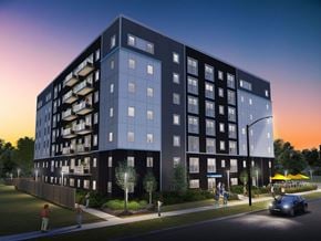 Winnipeg apartment for rent - A modern apartment building with balconies on the upper floors.