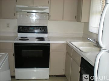 Loveland apartment for rent - A white oven and stove top are in a kitchen.