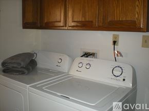 Loveland apartment for rent - A white washing machine with a towel on top of it.