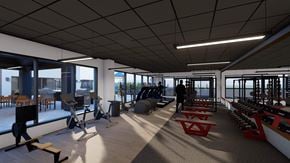 Saskatoon apartment for rent - A gym with a variety of equipment including treadmills, weights, and exercise machines.