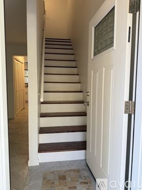 Surfside Beach townhouse for rent - A kitchen with a white fridge and stove.