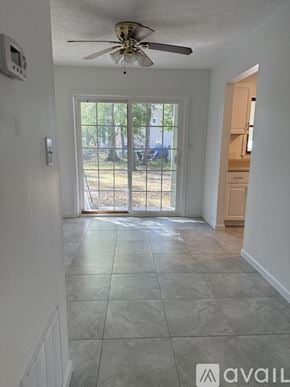 Surfside Beach townhouse for rent - A bathroom sink with a brown framed mirror above it.