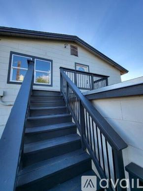San Antonio apartment for rent - A house with a staircase leading to the second floor.