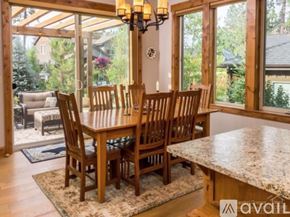 Bend townhouse for rent - A dining room with a table and chairs.