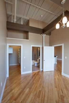 Pittsfield apartment for rent - a view of a living room with a hard wood floor