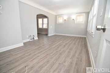 Hazel Park house for rent - A kitchen with a table and chairs.