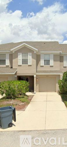 Lakewood Ranch house for rent - A two-story house with a garage and a driveway.