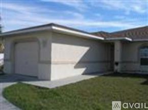 Cape Coral house for rent - A house with a garage is for sale.