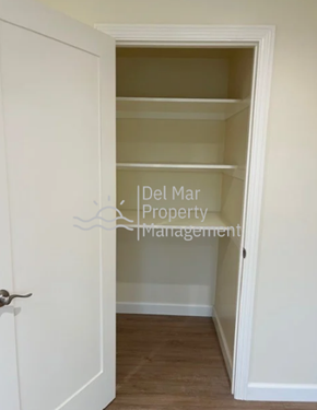 Morro Bay house for rent - A white door with a glass window is open.