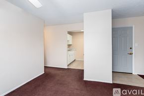 Fredericktown apartment for rent - A room with a door and a carpeted floor.