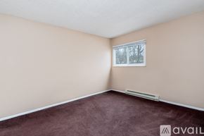 Fredericktown apartment for rent - A room with beige walls, a window, and a carpeted floor.