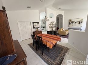 Delray Beach house for rent - A dining room with a table set for four.