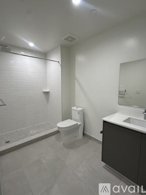 Oakland Park apartment for rent - A bathroom with a toilet, sink, and shower.