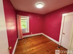 Taunton apartment for rent - A room with a window and a wooden floor.